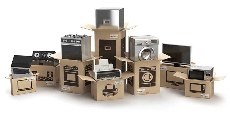 household electronic devices being packed in moving boxes